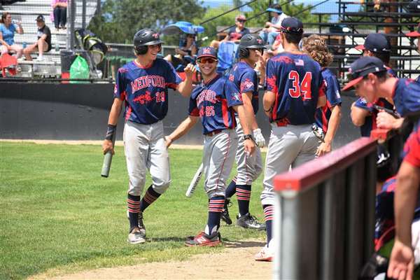 Medford Mustangs 2021 dugout celebration