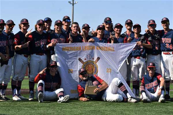Medford Mustangs 2022 State Champions team with banner